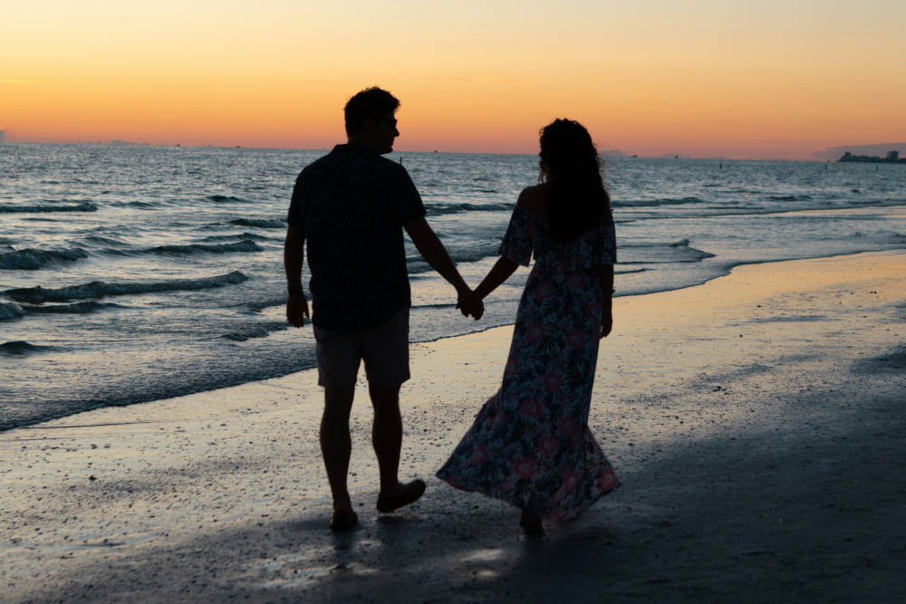 guy holds hand meaning